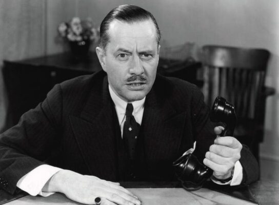 angry man with phone, demanding person demanding people at work